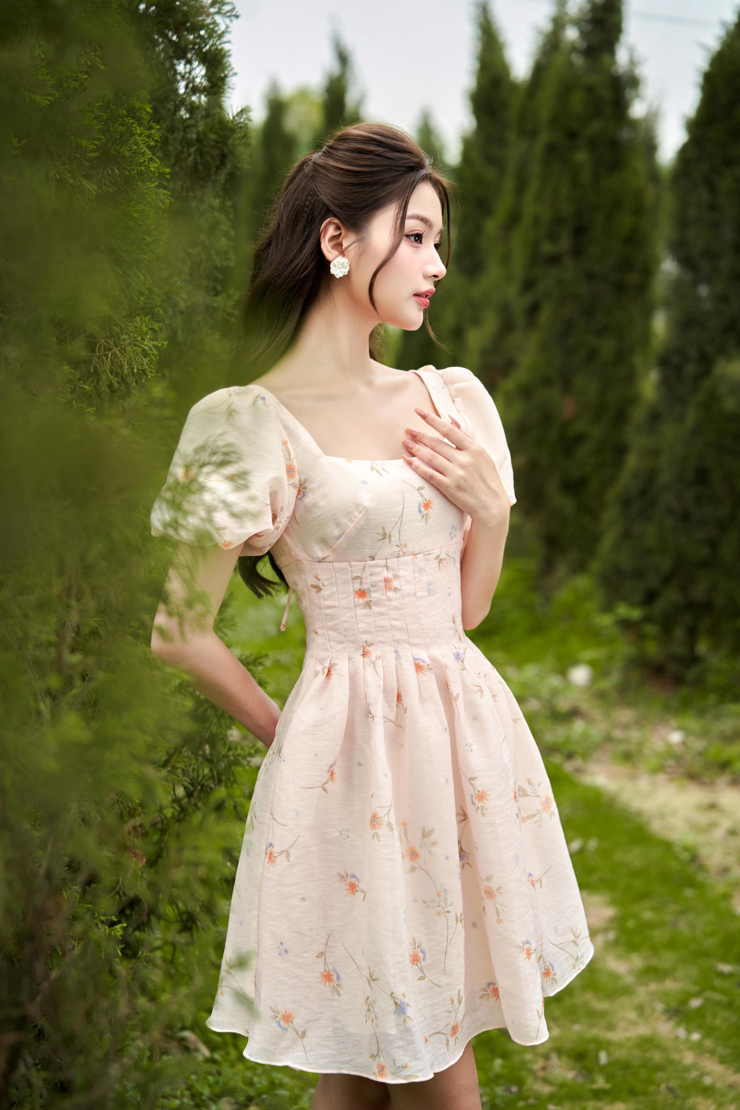 Emma - romantic floral garden mini dress in light orange color.