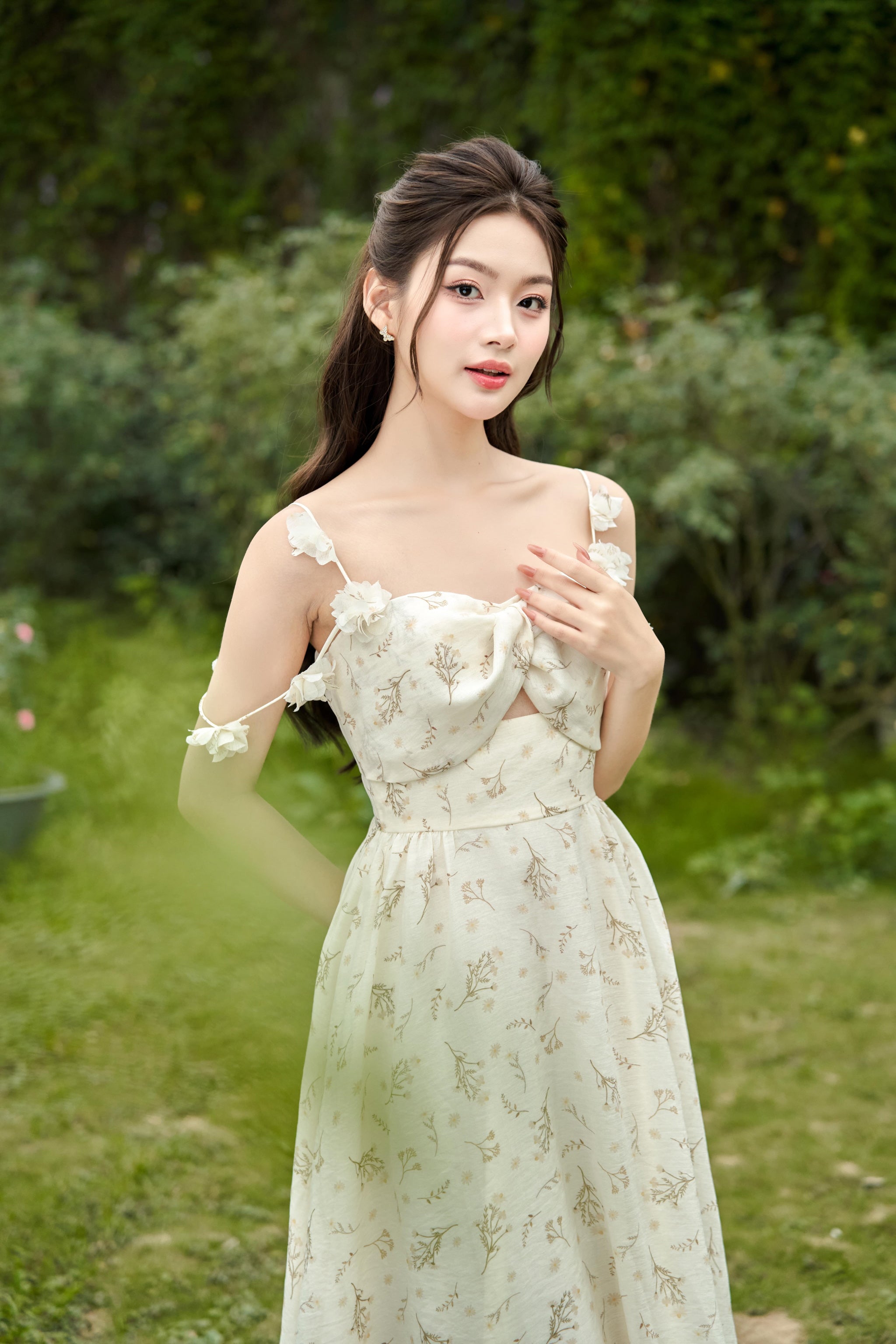 Fiore - Romantic printed mini floral twist front cutout midi dress